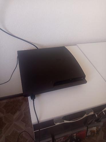 PS3 (Sony PlayStation 3): Игровая консоль Sony PlayStation 3 (модель Slim) с набором дисков — 1