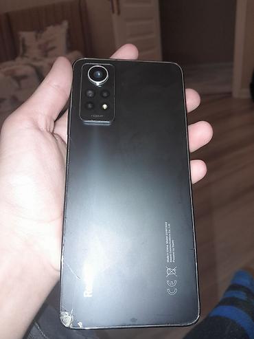 xiomi redmi note 12: Xiaomi Redmi smartfon - Model: Redmi (arxa hissədə Redmi loqosu, foto — 1