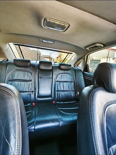 Hyundai: Hyundai Grandeur milvari biznes-sedan. Xüsusiyyətlər və avadanlıq: - — 5
