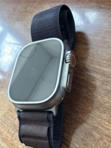 титан алмашам: Умные часы Apple Watch Ultra 2 с серым текстильным ремешком. Корпус