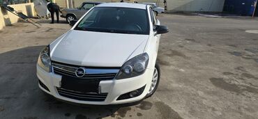 masin qosqusu: Opel Astra H 5 qapılı hetçbek - Kuzov: 5 qapılı hetçbek, ağ rəng