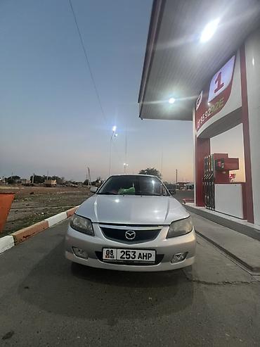 a4 b7: Mazda Familia: 2003 г., 1.5 л, Механика, Бензин, Универсал — 3