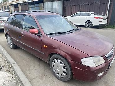mazda 2000: Mazda 323: 2001 г., 1.6 л, Механика, Бензин, Универсал — 2