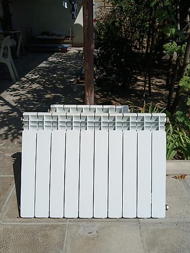 seksiyali radiator: 6 senksiyalı ataplena satılır. Arxadakıdı. Qiyməti 45 manat. Ünvan — 2