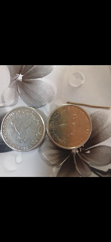 guarana coffe: Məhsul: BƏƏ dirhəmi sikkələri – 50 fils (2 ədəd) Təsvir: - Üz tərəfi — 2