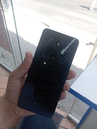 şarj: Xiaomi 14 Civi, 128 GB, rəng - Qara, 
 Zəmanət, Qırıq, Düyməli