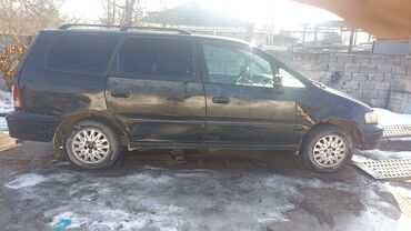 авто машину: Продается минивэн Honda Odyssey черного цвета. Автомобиль имеет