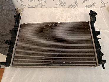 opel 1.5 dizel motor: Salam opel radiatoru satilir. opel merivanin ustunnen cixmadir — 1
