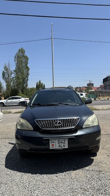 купить багажник на крышу авто в бишкеке: Автомобиль Lexus RX 300 темно-серого цвета. Имеет хромированную