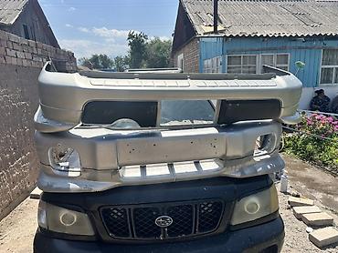 Бампер и комплектующие: Передний бампер для Subaru Forester SF (2002). Пара состоится хорошая — 1