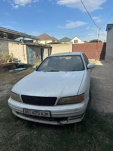 сефия: Nissan Altima: 1995 г., Седан — 4