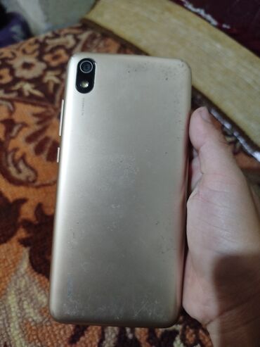 я ищу бу телефон: Redmi, Redmi 7A, Б/у, 64 ГБ, цвет - Золотой, 1 SIM