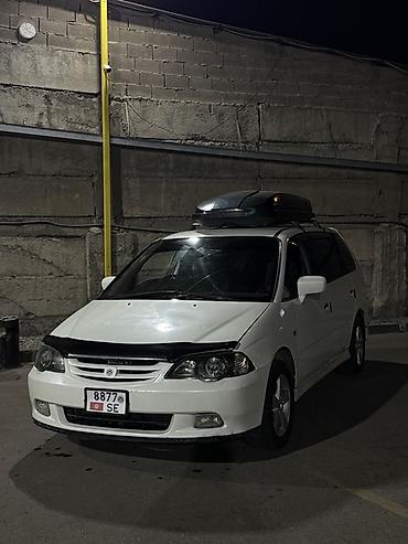 ветровик на 210: Honda Odyssey: 2000 г., 2.3 л, Автомат, Газ, Универсал — 1