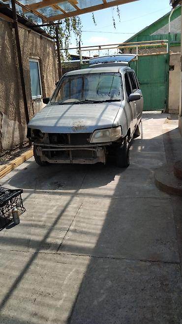 Транспорт: Nissan : 1999 г. — 1
