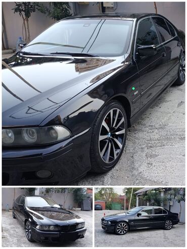 Dörd qapılı qara rəngli BMW sedan avtomobili. Avtomobilin xarici