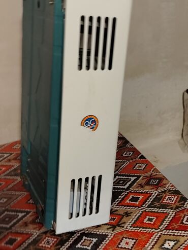 Digər su qızdırıcıları: Termolux firmasının 20 litrlik qaz su qızdırıcısı. Evdə və ya ofisdə