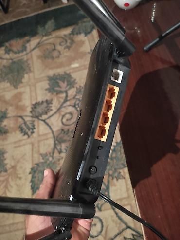 wifi modem satilir: Tp Link Orginal 4 qulaqli Modem tam işlək vəziyyətdədir. Dalğa Yayımı — 1