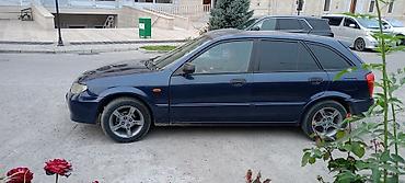 shevrolet lacetti: Mazda 323: 2003 г., 1.3 л, Механика, Бензин, Хэтчбэк — 5