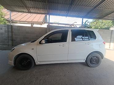 мазла: Mazda Demio: 2004 г., 1.5 л, Автомат, Бензин, Хэтчбэк — 2