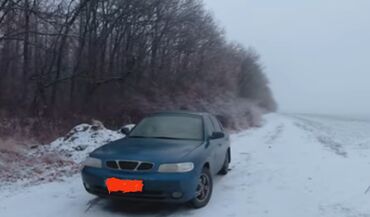 Daewoo: Daewoo Nubira: 1997 г., 1.6 л, Механика, Бензин, Седан