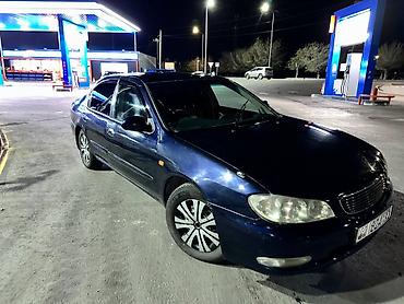 Другие автомобили: Седан бизнес‑класса темно-синего цвета. Просторный салон с мягкой — 8