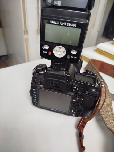 Информатика: Nikon D7000 satılır. Üstündə fleş 2 ədəd kart verilir. Əlavə olaraq, 4