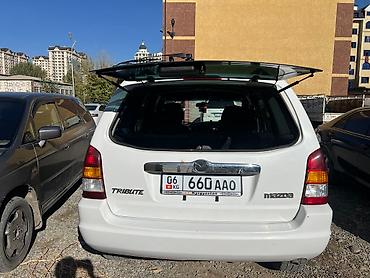 аренда mazda 323: Mazda Tribute: 2002 г., 2 л, Автомат, Бензин, Внедорожник — 5