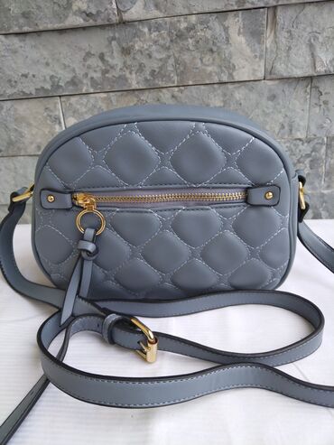 lacoste torbice muske: Elegant purse
