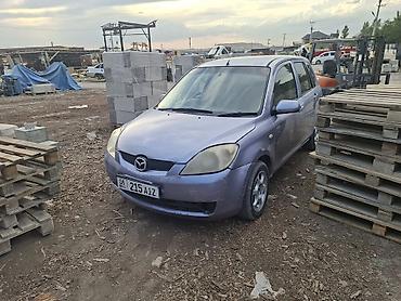 Транспорт: Mazda Demio: 2005 г., 1.5 л, Автомат, Бензин, Хэтчбэк — 1