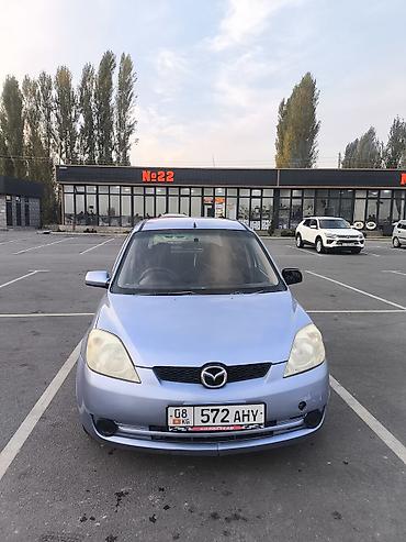 глушитель выхлопных: Mazda Demio: 2005 г., 1.3 л, Автомат, Бензин, Хэтчбэк — 1
