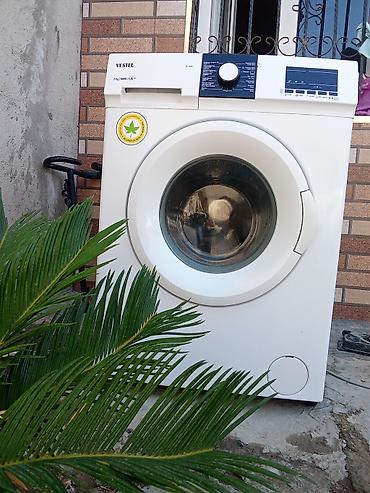 corab toxuyan: Vestel önyükləməli paltaryuyan maşın - Model: VP 7104 (paneldə qeyd — 2