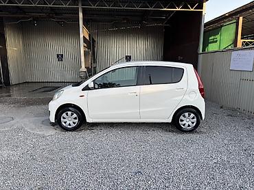 бу болон: Daihatsu Cuore: 2009 г., 1 л, Автомат, Бензин, Хэтчбэк — 4
