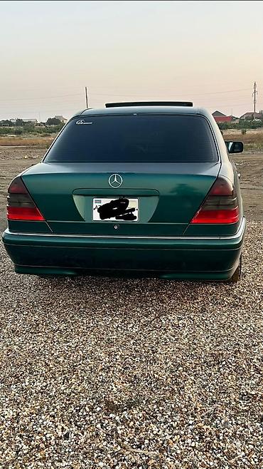 Mercedes-Benz C-Sinfi sedan (W202) – tünd yaşıl rəng, bej dəri salon lalafo.az -da Mercedes-Benz C-Sinfi sedan (W202) – tünd yaşıl rəng, bej dəri salon