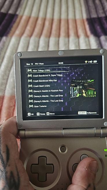 retroid pocket 5: Anbernic RG35XXSP — retro oyunlar üçün nəzərdə tutulmuş portativ (əl — 6