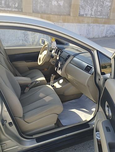 ucuz ford transit: Nissan Tiida: 1.6 l | Sedan — 7