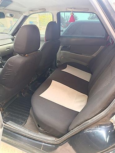 1 64: VAZ (LADA) Priora: 1.6 l | 2008 il 330000 km Sedan — 5