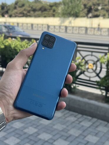 Samsung: Samsung Galaxy A12, 64 GB, rəng - Göy, Düyməli, Barmaq izi, Face ID