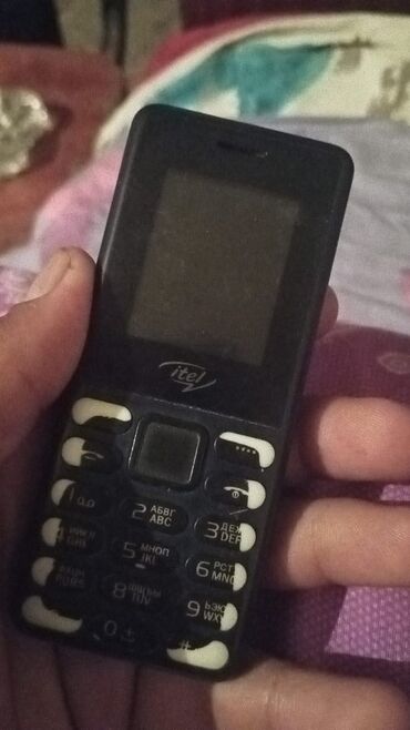ən yaxşı epilyator: Itel düyməli telefon - Kompakt korpus, asan daşınma - Rəqəmsal ekran