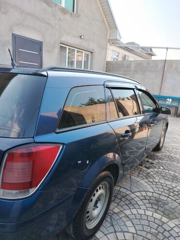 Opel: Opel Astra H Caravan (universal), göy rəng. - Kuzov: universal — 4