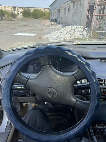 Транспорт: Mazda Cronos: 1993 г., Механика, Бензин, Седан — 5