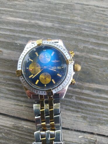 Kişi Geyimləri: Qol saatı, Breitling