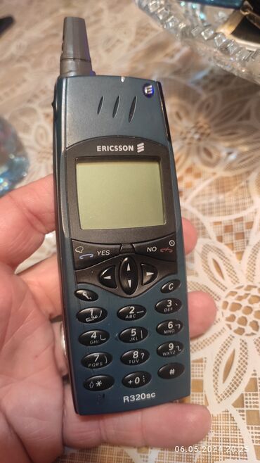 телефон fly 5s: Ericsson R320S, < 2 ГБ, цвет - Голубой, Кнопочный