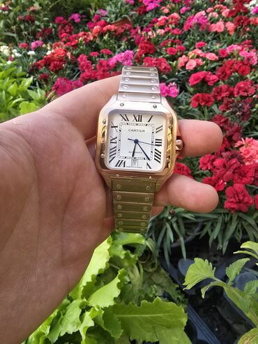 qizil qolbaglar: Наручные часы, Cartier, цвет - Золотой