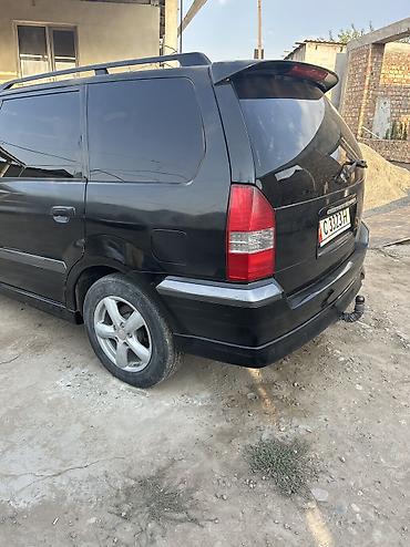 2107 2011: Mitsubishi Space Wagon: 2001 г., 2.4 л, Автомат, Бензин, Минивэн — 4