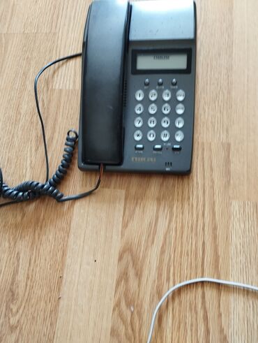 t28 telefon: Stasionar telefon bir ədədi 25 manat ikisi birlikdə 50 manat
