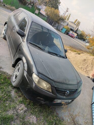 мопед советский: Mazda 323: 2002 г., 1.3 л, Механика, Бензин, Хэтчбэк