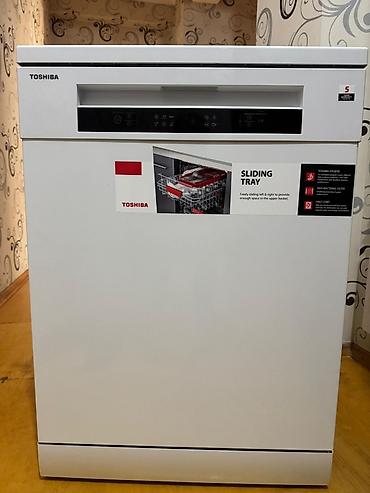 yer yuyan: Toshiba qabyuyan maşın cemi iki ay istifade olunub qiymet 500 AZN — 1