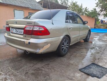 фара нехсия 2: Mazda 626: 2000 г., 1.8 л, Механика, Бензин, Седан