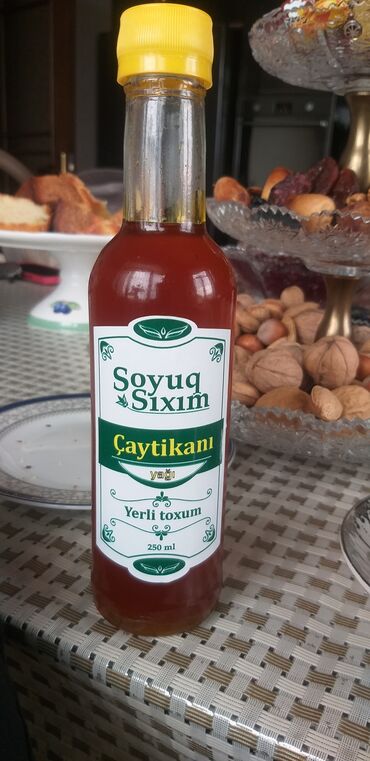 Bitki yağı: "Soyuq Sıxım Çaytikanı yağı" - 250 ml həcmində, yerli toxumdan əldə
