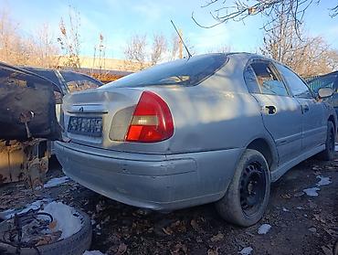 Другие детали кузова: Mitsubishi Carisma, хеджбек, серебристый цвет, все запчасти есть а — 3